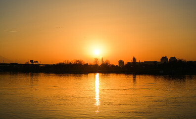 Sunset with reflection in the river 