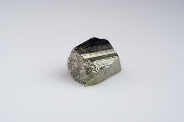 Natural gemstone pyrite on white background