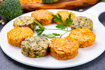 Small tasty vegan and vegetarian burgers made from fresh vegetables and dried legumes and beans