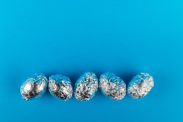 Eggs in aluminum foil.