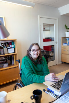 Disabled woman working in office