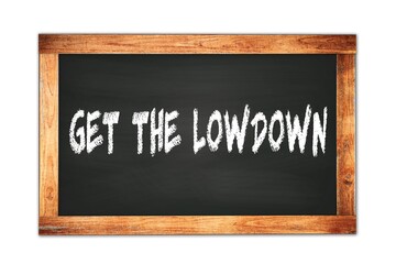 GET  THE  LOWDOWN text written on wooden frame school blackboard.