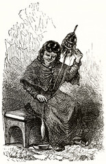 South American woman spinning wool seated on a stool. Ancient grey tone etching style art by Riou, Le Tour du Monde, 1862