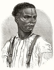 Obraz premium portrait of Yambane man with particular decoration starting from forehead and ending on top of nose, Reunion island. Ancient grey tone etching style art by Riou, Le Tour du Monde, 1862