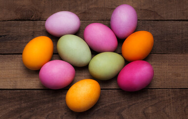 bright easter eggs on a wooden background