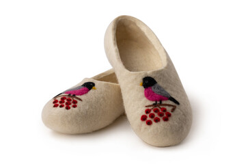 Felt slippers on white background in closeup