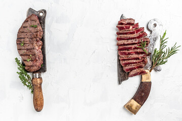 Fresh raw Prime Black Angus beef rump steak or top sirloin beef meat steak served on old meat...