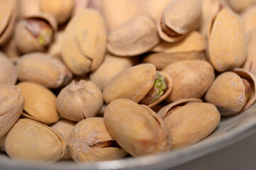 salted pistachio nuts in a bowl