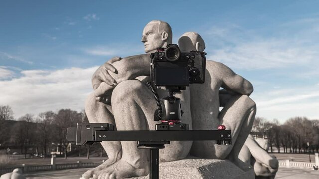 Digital Camera Moving On Right By Camera Slider Shooting Art Sculpture Of Gustav Vigeland At Frogner Park, Oslo, Norway. - hyperlapse, zoom out
