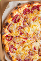 pepperoni pizza tomato sauce and cheese trend meal copy space food background rustic. top view