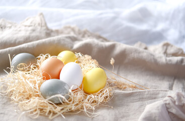 Organic naturally dyed yellow and gray Easter eggs.