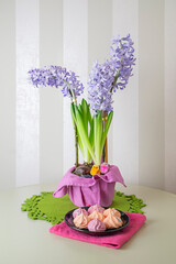 Spring Easter still life with hyacinths, chickens and meringues