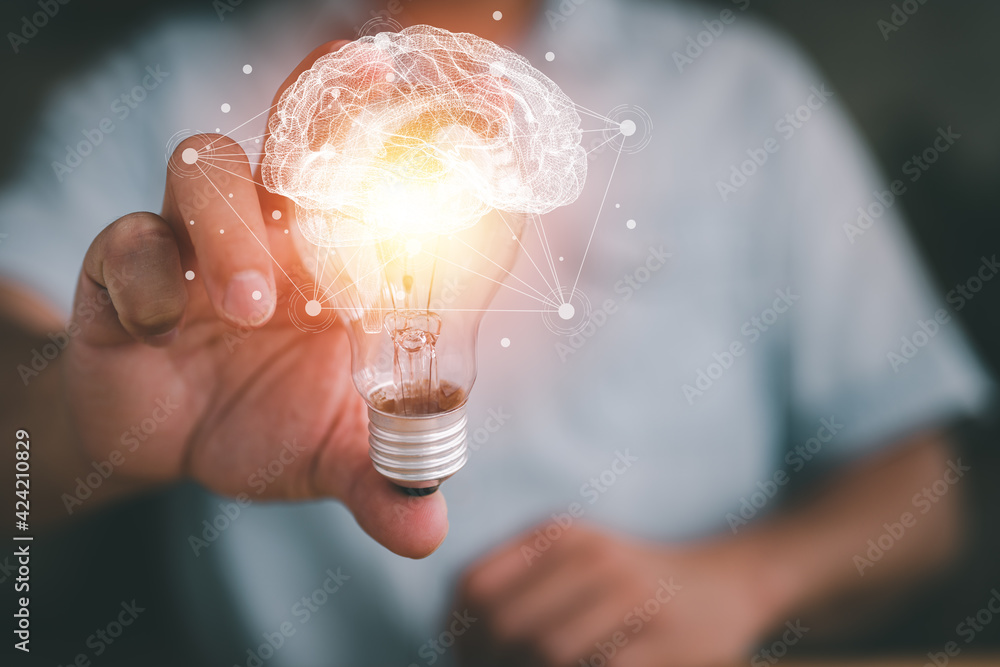 Aufkleber Idea concept and light bulbs with Brain and connection line, businessman show new ideas with innovative technology and creativity.
