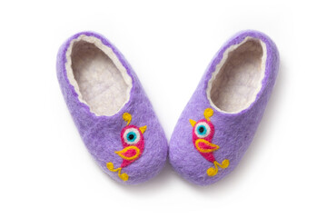 Felt slippers on white background in closeup
