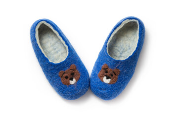 Felt slippers on white background in closeup