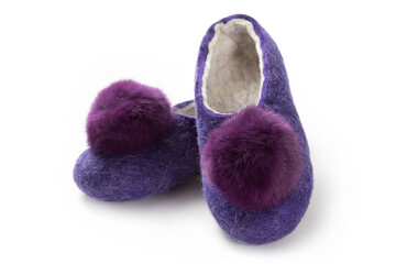 Felt slippers on white background in closeup