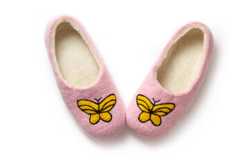 Felt slippers on white background in closeup