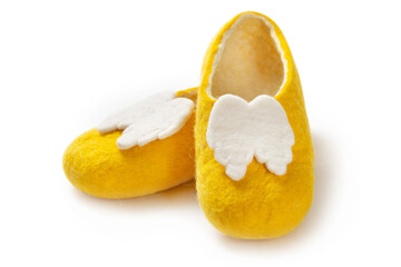 Felt slippers on white background in closeup
