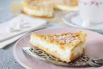 Italian orange and ricotta (cottage cheese) grated tart and tea cup