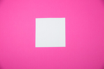 Blank white To Do List Sticker. Close up of reminder note paper on the pink background. Copy space. Minimalism, original and creative photo.