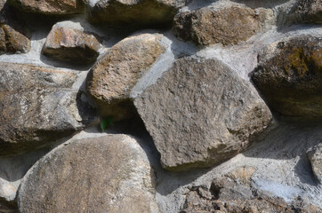 Cement stone wall texture for a background.