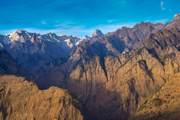 Mesmerizing view of Kamet, Parvati and Neelkanth mountains of Garhwal Himalayas from Kuari pass hiking trail near Auli, Uttarakhand, India.