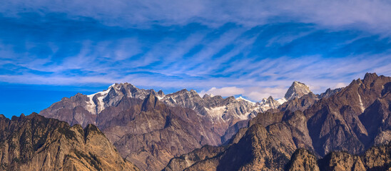 Mesmerizing view of Kamet, Parvati and Neelkanth mountains of Garhwal Himalayas from Kuari pass hiking trail near Auli, Uttarakhand, India.