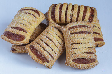 Tasty cookies with apple jam closeup.