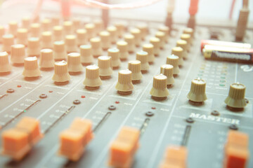 Fototapeta premium Vintage recording studio sound mixer. Controller of old audio production console. sound audio analog of radio soundboard board.
