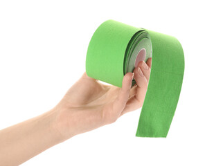 Woman with bright kinesio tape in roll on white background, closeup