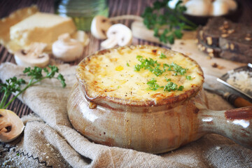 Mushroom julienne baked with cheese