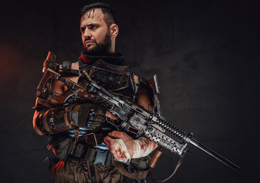 Damaged survivor with bandaged arm holding shotgun