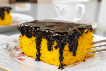 detail of carrot cake with chocolate icing. Selective focus
