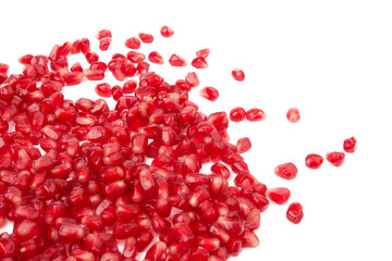 Pomegranate seeds on white