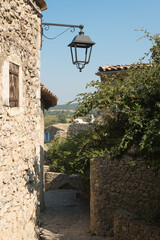 street view of an old village in france