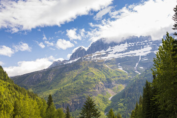 Fototapeta na wymiar Snow covered mountains in Glacier National Park, Montana