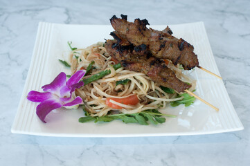 Papaya Salad with Beef Skewers