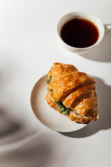 croissant banner with coffee on a light background