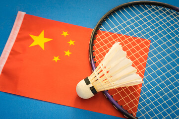 Badminton racket and shuttlecocks on China  flag.