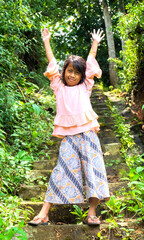 girl jumping in the park