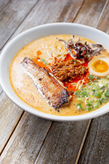 A view of a bowl of tonkatsu ramen.