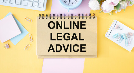 The text of legal advice online on a notepad, lying on the table.