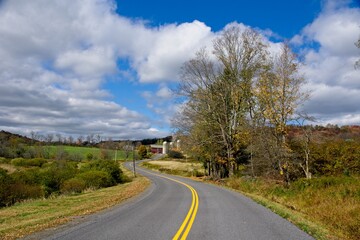 Autumn scene with windy road in Delaware County NY