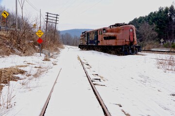 Old train locomotive in the snow