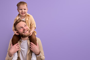Bearded Caucasian Father Playing With Son, Children and Family Concept