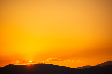 Mirage sunset over mountain range in Armenia