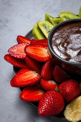 Dish of Fruits with chocolate ready to eat take away