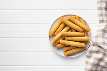 Sweet waffle tubes rolls on plate
