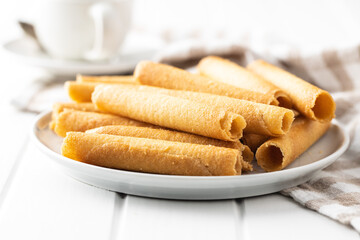 Sweet waffle tubes rolls on plate