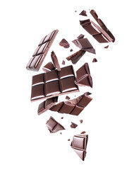 Crushed bar of dark chocolate in the air on a white background